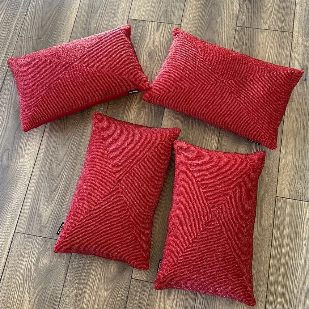 4 SAFAVIEH Beautiful Beaded toss pillows in a rich jewel tone red
